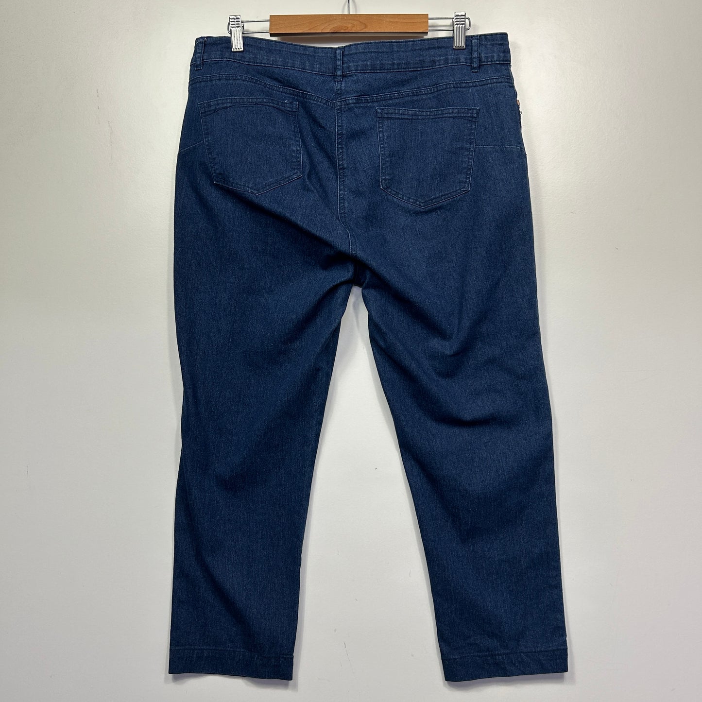 Dark blue denim jeans back view