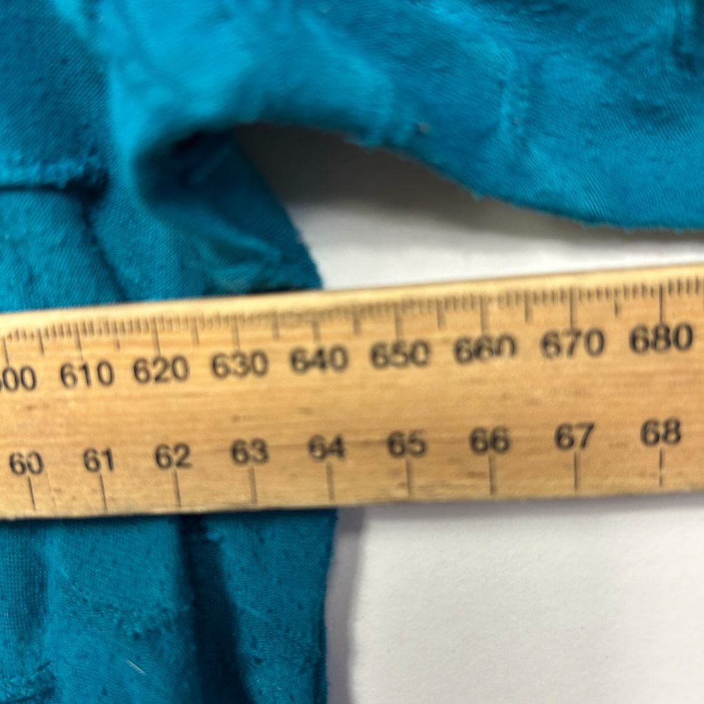 Blue fabric with measurement ruler detail view