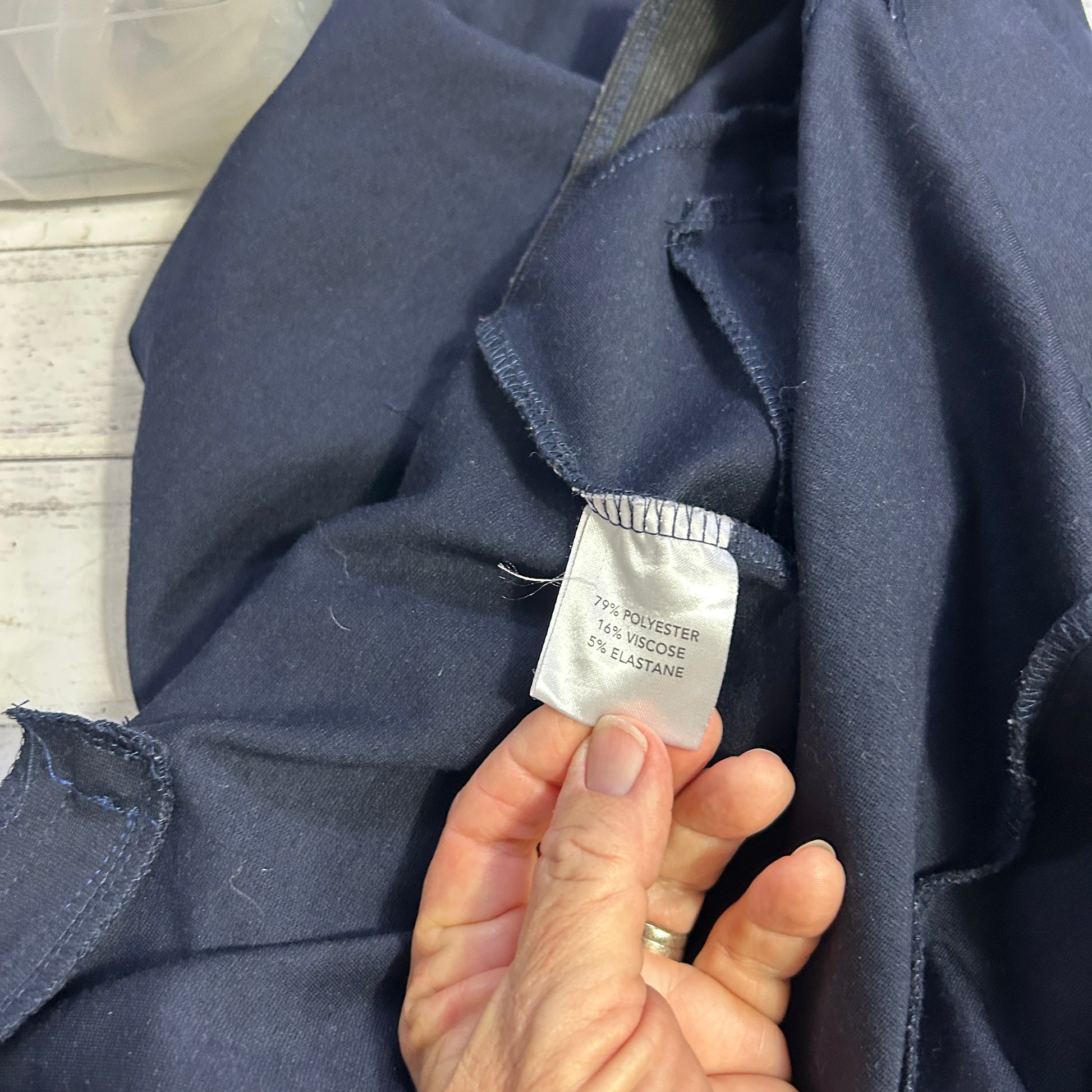 Navy blue jacket label detail view