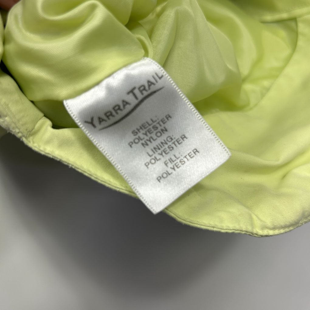 Lime green fabric detail view with Yarra Trail label