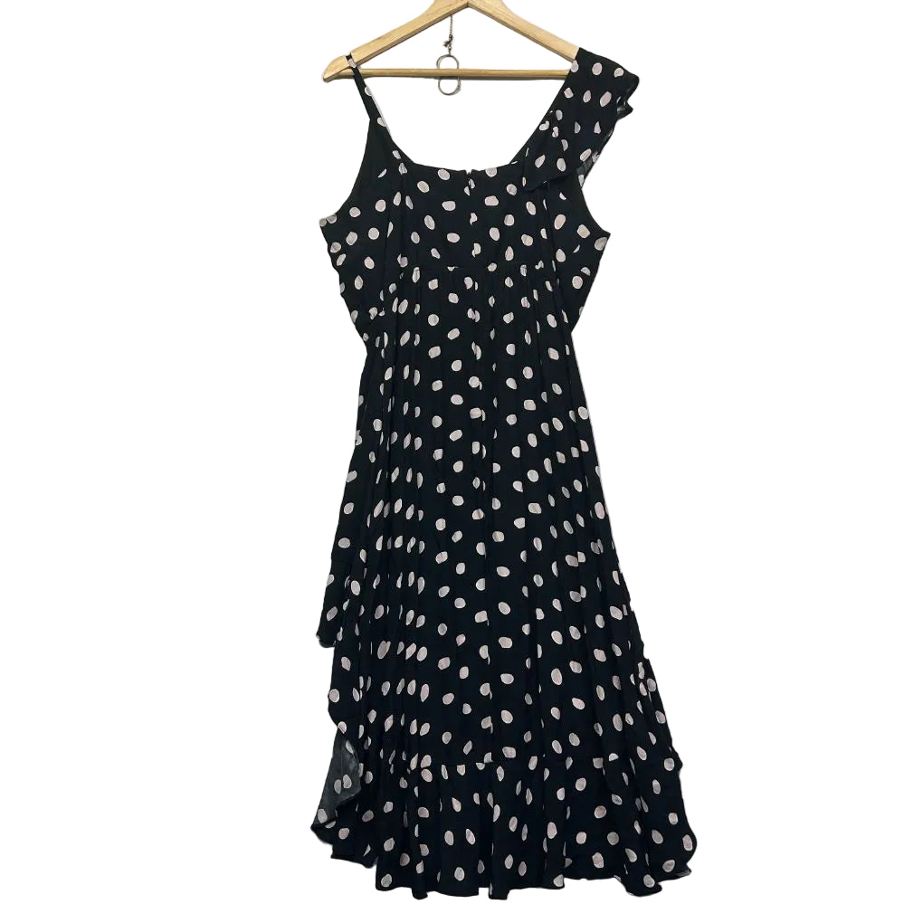 Black and white polka dot sleeveless dress front view