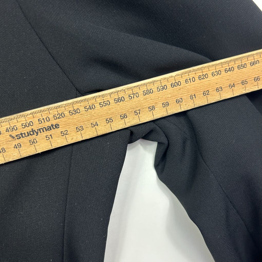 Navy fabric with measuring tape detail view