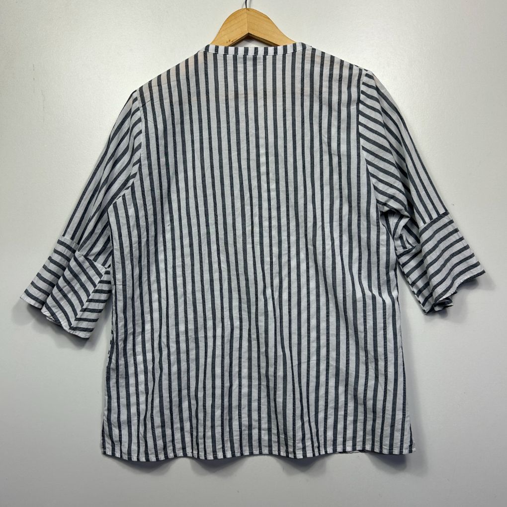 Grey and white striped shirt back view