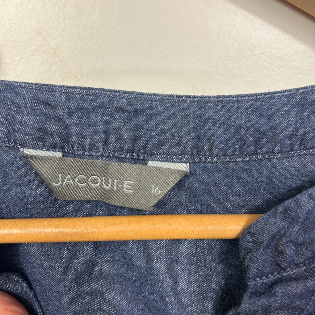 Blue denim shirt label detail view
