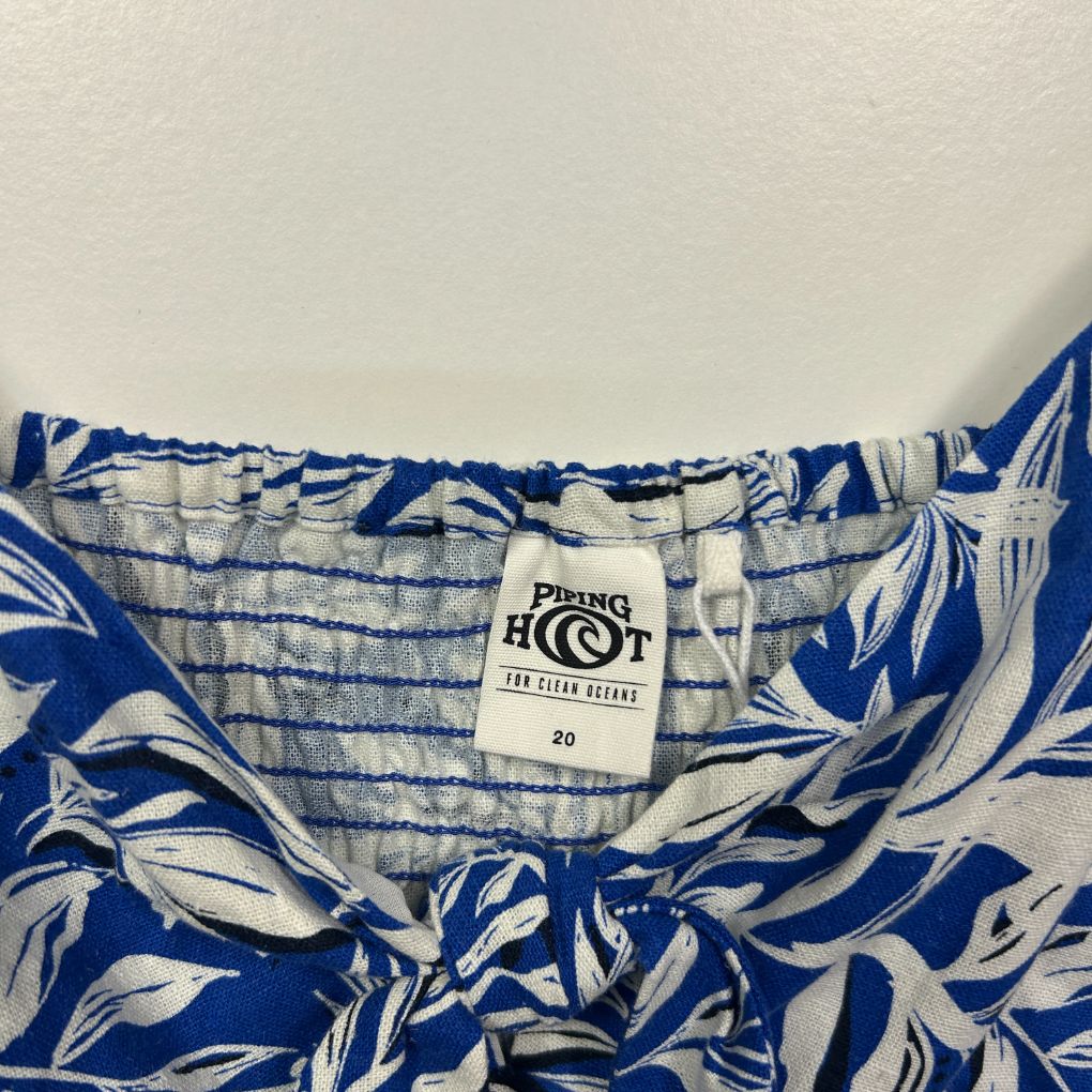 Blue and white floral print shorts detail view