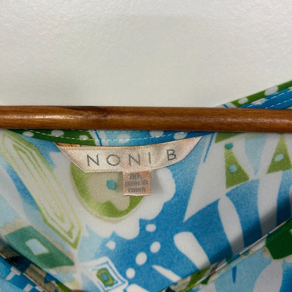 Blue floral fabric detail with wooden hanger