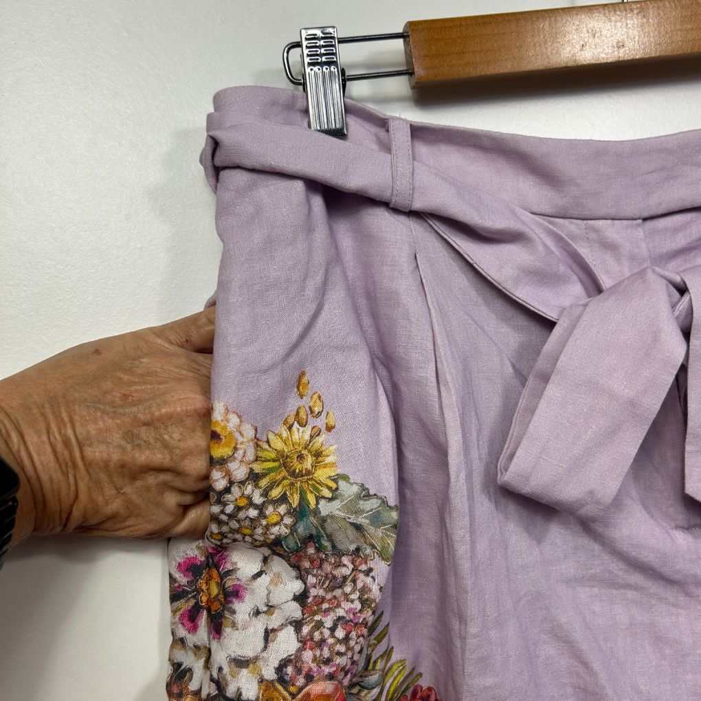 Lavender linen shirt detail view with embroidered floral design
