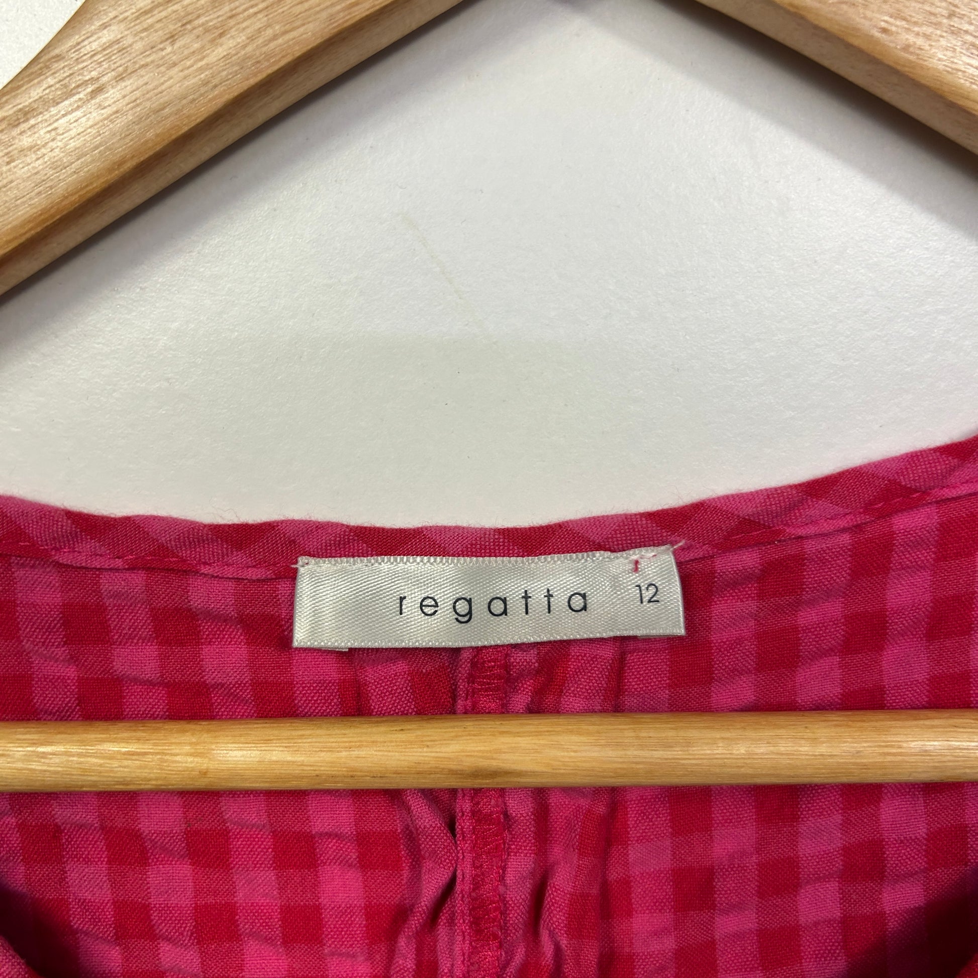 Pink gingham shirt label detail view