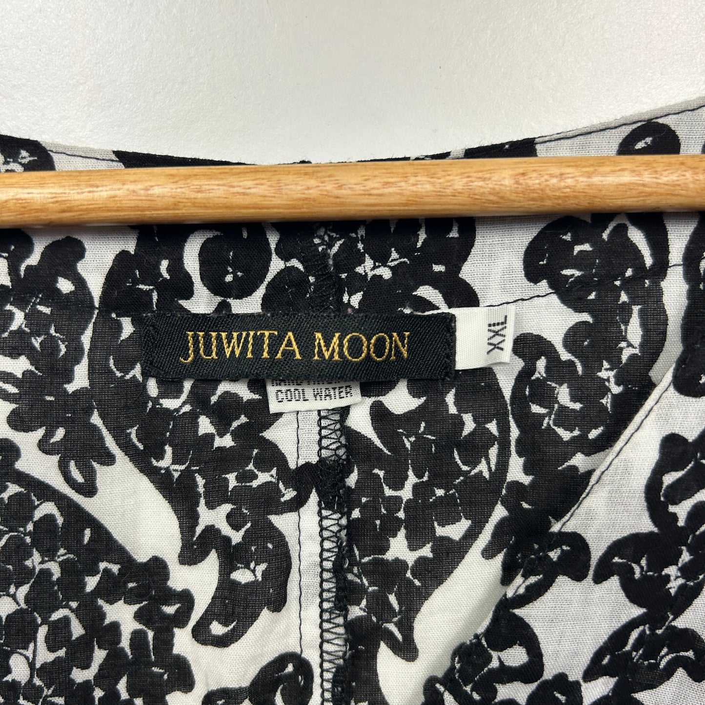 Black and white floral print top detail view