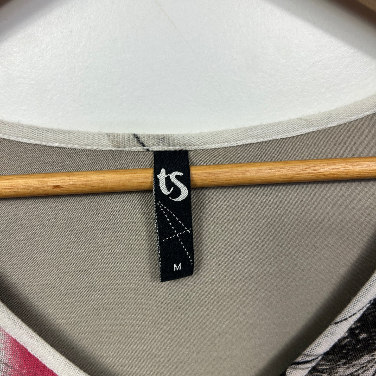 White t-shirt label detail view