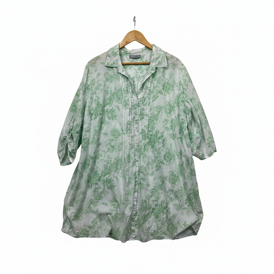 Nouvelle green and white paisley dress on hanger