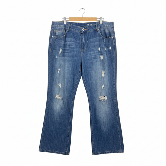 Expression blue distressed bootcut jeans with ripped details