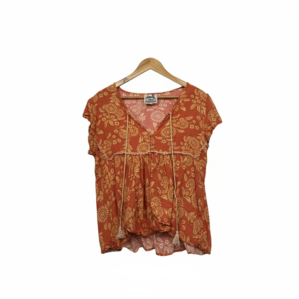 Janse coral floral top on white background